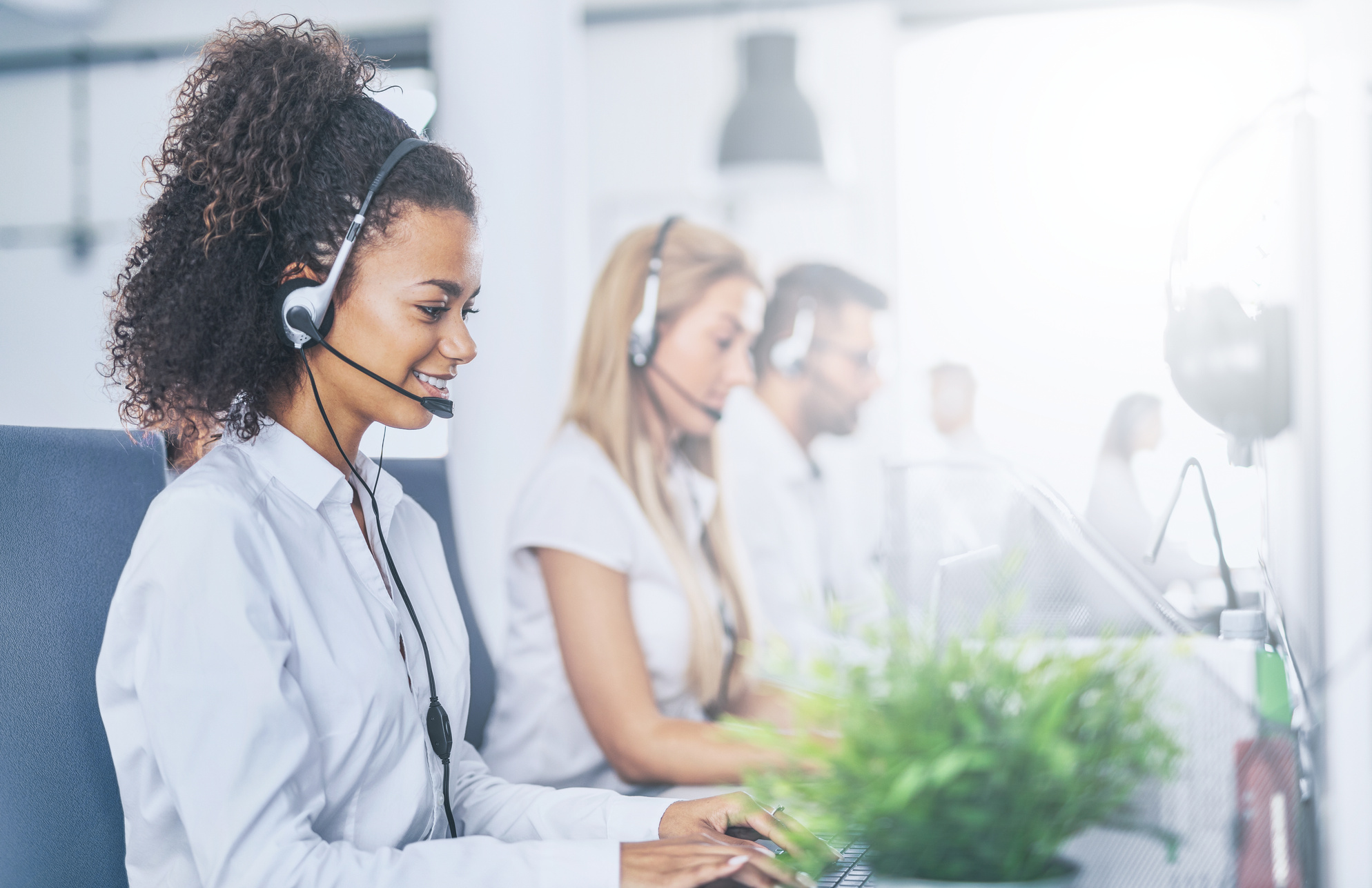 Call Center Worker Accompanied by Her Team